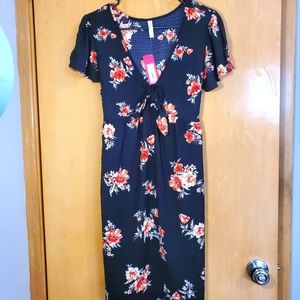 New with tags! Black, floral, Mini dress, with flutter sleeves. Size small